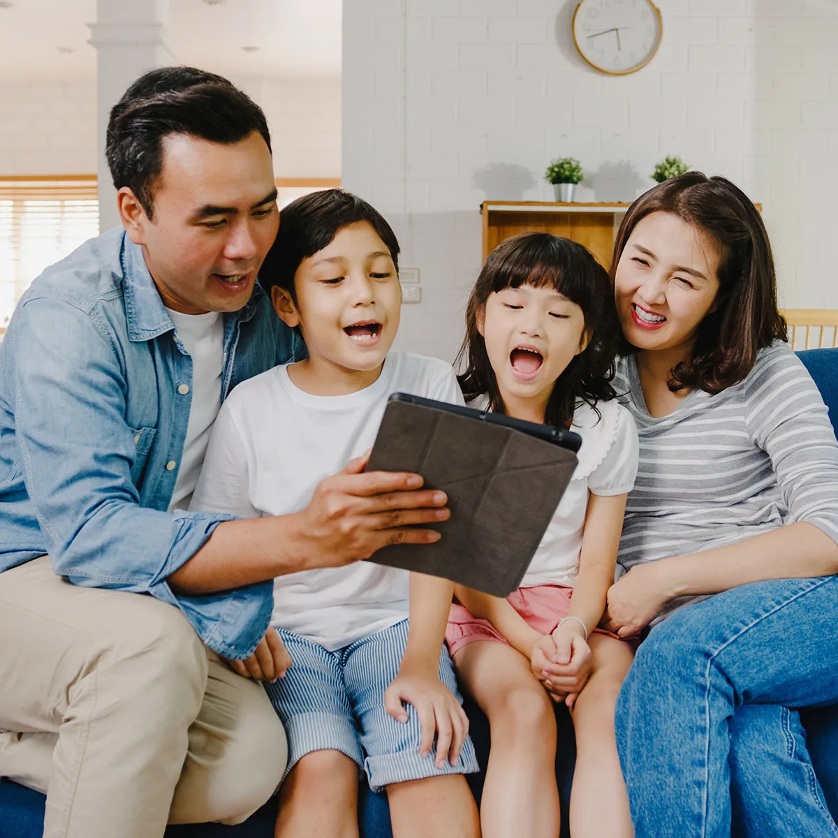 Filipino family managing digital banking